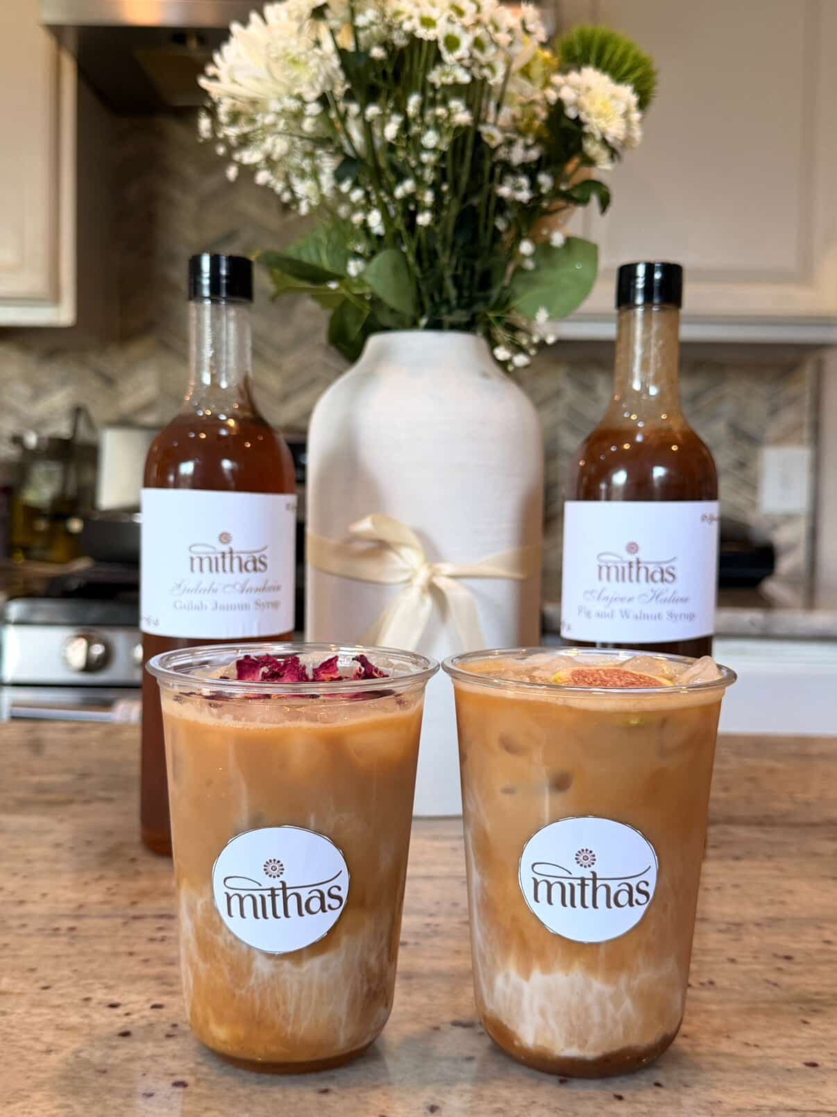 Mithas bottle lineup with specialty lattes